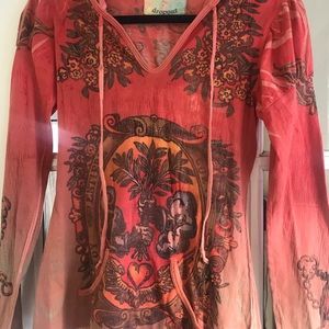 Orange pullover top with hood